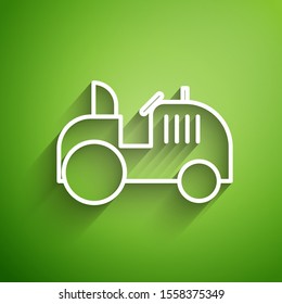 White line Tractor icon isolated on green background.  Vector Illustration