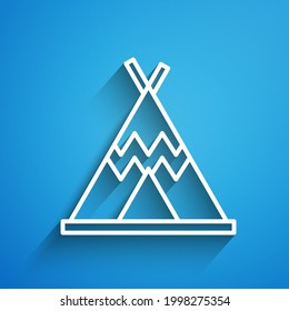 White line Traditional indian teepee or wigwam icon isolated on blue background. Indian tent. Long shadow. Vector