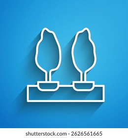 White line Trees icon isolated on blue background. Forest symbol. Long shadow. Vector