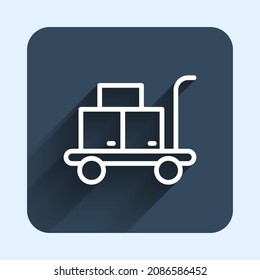 White line Trolley suitcase icon isolated with long shadow background. Traveling baggage sign. Travel luggage icon. Blue square button. Vector