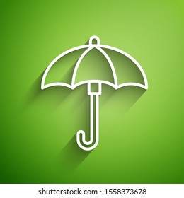 White line Umbrella icon isolated on green background. Waterproof icon. Protection, safety, security concept. Water resistant symbol.  Vector Illustration
