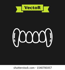 White line Vampire teeth icon isolated on black background. Happy Halloween party.  Vector Illustration