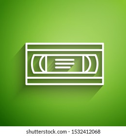 White line VHS video cassette tape icon isolated on green background.  Vector Illustration