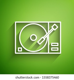 White line Vinyl player with a vinyl disk icon isolated on green background.  Vector Illustration