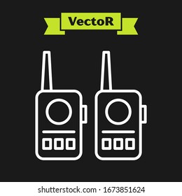 White line Walkie talkie icon isolated on black background. Portable radio transmitter icon. Radio transceiver sign.  Vector Illustration