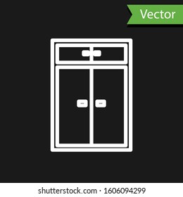 White line Wardrobe icon isolated on black background.  Vector Illustration
