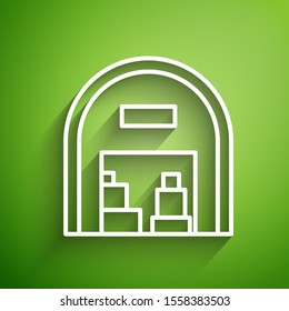 White line Warehouse icon isolated on green background.  Vector Illustration