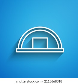 White line Warehouse icon isolated on blue background. Long shadow. Vector