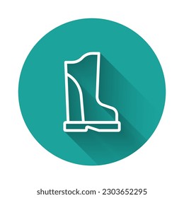 White line Waterproof rubber boot icon isolated with long shadow background. Gumboots for rainy weather, fishing, gardening. Green circle button. Vector