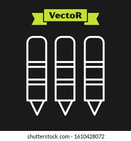 White line Wax crayons for drawing icon isolated on black background.  Vector Illustration