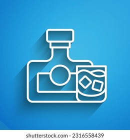 White line Whiskey bottle and glass icon isolated on blue background. Long shadow. Vector