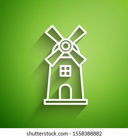 White line Windmill icon isolated on green background.  Vector Illustration