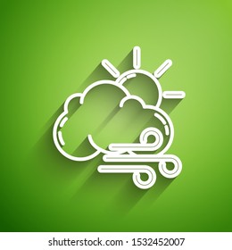 White line Windy weather icon isolated on green background. Sun with cloud and wind.  Vector Illustration