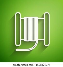 White line Wire electric cable on a reel or drum icon isolated on green background.  Vector Illustration