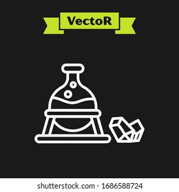 White line Witch cauldron and magic stone icon isolated on black background.  Vector Illustration