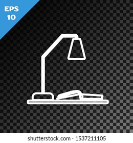 White line Workplace with table lamp and open book icon isolated on transparent dark background. Table office lamp.  Vector Illustration