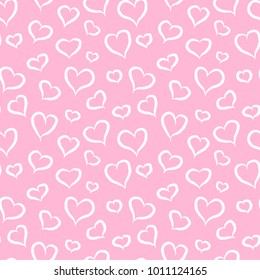 White lined hearts on pink background. Seamless vector valentine's day pattern.