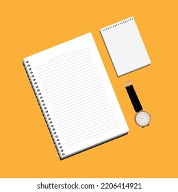 A white lined notebook and a notepad for writing notes are placed next to a wristwatch with a black strap