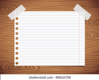 White lined notebook paper sheet is stuck on gray wooden wall, desk