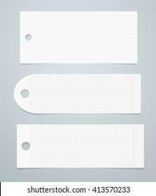 White lined and squared paper tags are stuck on light gray background