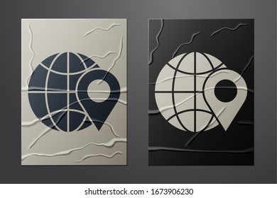 White Location on the globe icon isolated on crumpled paper background. World or Earth sign. Paper art style. Vector Illustration