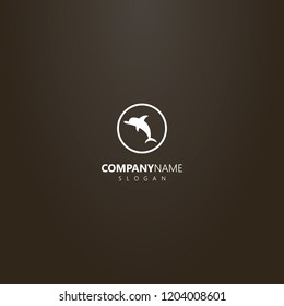 white logo on a black background. simple vector isolated logo of flat art dolphin in a round frame