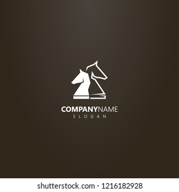 white logo on a black background. simple vector logo of two chess knight pieces