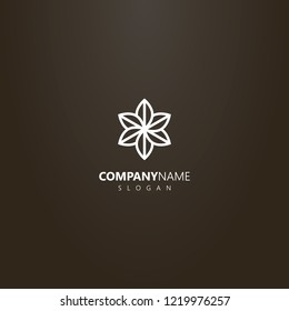 white logo on a black background. vector geometric line art logo of a six-leafed flower