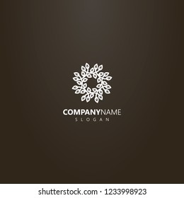 white logo on a black background. vector round logo of wreath of branches with foliage