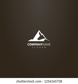 white logo on a black background. vector geometric outline logo of high peak rocky mountains