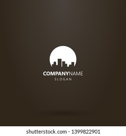white logo on a black background. simple vector negative space round  cityscape logo of high-rise houses