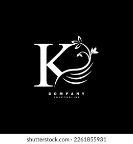 white luxury K letter logo with beautiful floral and feather ornament. feather logo. K typography, K monogram. Suitable for business logos, brands, companies, boutiques, beauty logos, etc