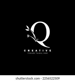 white luxury Q logo design with beautiful floral and leaf ornament decoration. initial Q letter logo. monogram Q typography. feather logo