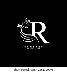 white luxury R letter logo with beautiful floral and feather ornament. feather logo. R typography, R monogram. Suitable for business logos, brands, companies, boutiques, beauty logos, etc
