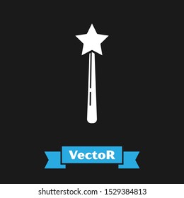 White Magic wand icon isolated on black background. Star shape magic accessory. Magical power.  Vector Illustration