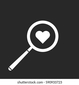 white magnifier with a love shape on the lens with flat black square background