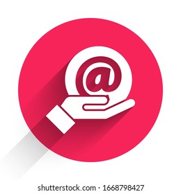 White Mail and e-mail in hand icon isolated with long shadow. Envelope symbol e-mail. Email message sign. Red circle button. Vector Illustration