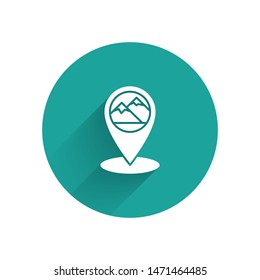 White Map pointer with mountain icon isolated with long shadow. Mountains travel icon. Green circle button. Vector Illustration