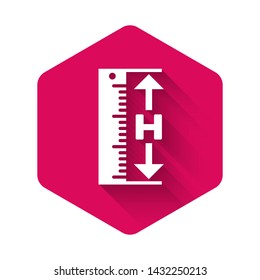 White The measuring height and length icon isolated with long shadow. Ruler, straightedge, scale symbol. Pink hexagon button. Vector Illustration