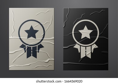 White Medal with star icon isolated on crumpled paper background. Winner achievement sign. Award medal. Paper art style. Vector Illustration