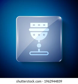 White Medieval goblet icon isolated on blue background. Square glass panels. Vector