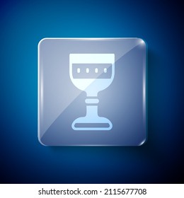 White Medieval goblet icon isolated on blue background. Square glass panels. Vector