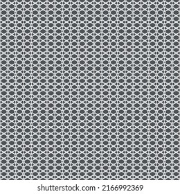 white mesh pattern with knitted fabric texture on dark background