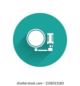 White Microphone icon isolated with long shadow. On air radio mic microphone. Speaker sign. Green circle button. Vector Illustration