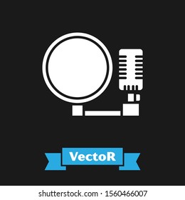 White Microphone icon isolated on black background. On air radio mic microphone. Speaker sign.  Vector Illustration