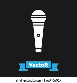 White Microphone icon isolated on black background. On air radio mic microphone. Speaker sign.  Vector Illustration
