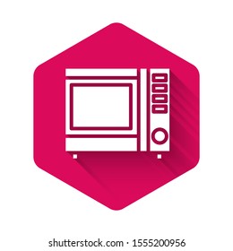 White Microwave oven icon isolated with long shadow. Home appliances icon. Pink hexagon button. Vector Illustration