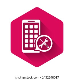 White Mobile Apps with screwdriver and wrench icon isolated with long shadow. Adjusting, service, setting, maintenance, repair, fixing. Pink hexagon button. Vector Illustration