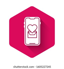 White Mobile phone with heart icon isolated with long shadow. Valentines day. Pink hexagon button. Vector Illustration