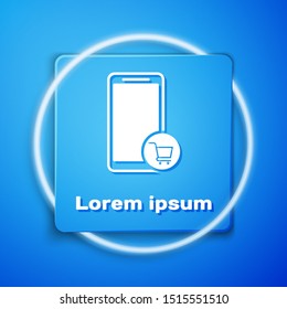 White Mobile phone and shopping cart icon isolated on blue background. Online buying symbol. Supermarket basket symbol. Blue square button. Vector Illustration